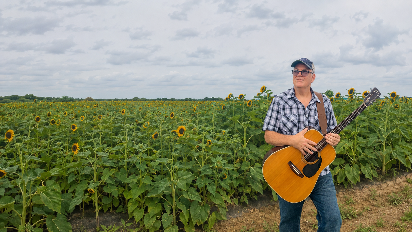 Dave Bermingham with his guitar at a South Jersey vineyard